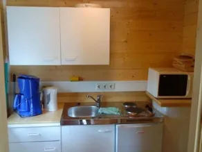 Holiday Home Kleines gemutliches Ferienhaus im Blockhausstil by Interhome - Image 5