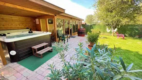 Holiday home with sauna, jacuzzi & garden - Image 2
