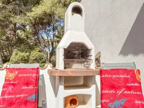 Holiday home with barbeque, terrace & garden | Garden view | Next to the beach | Pets are welcome - Image 4