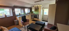 Cozy 1-bed flat with open kitchen, spacious living room, and bathroom with shower and bath. Perfect for comfort and relaxation. - Image 3