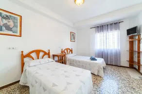 Room 'Habitación Triple' with Wi-Fi and Air Conditioning - Image 2