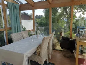 Holiday home with garden, sauna & barbeque | Garden view - Image 3