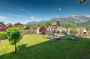Child-friendly flat with sauna, garden & barbeque | Garden view - Image 3