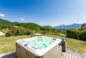 Maison de vacances avec jacuzzi, sauna et jardin | Vue jardin - Image 4