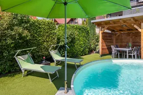 Family-friendly holiday home with terrace, garden & heated pool | Mountain view | Perfect for remote work - Image 3