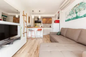 Appartement de vacances avec terrasse, jardin et piscine | Vue jardin | À côté de la plage - Image 5