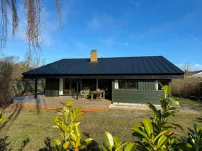 1970s holiday home with beach at the road's end - Image 2