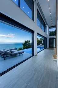ESCAPE TO SERENITY: Modern 2 Bedroom Villa with Private Heated Infinity Pool, BBQ area, Large Garden, Jacuzzi, and Sauna with Breathtaking Sea Views - Image 3