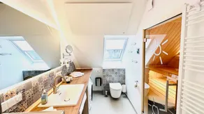 Appartement de vacances entièrement équipé avec sauna, barbecue et terrasse | Vue jardin | À côté de la plage - Image 5