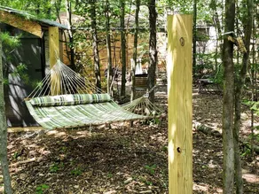 Cozy 30’ Trailer Getaway on Private Wooded Lot, BBQ, Hammock, WiFi & Streaming in Prescott, Michigan - Image 3