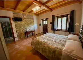 Agriturismo Poggiacolle dell'azienda vitivinicola Faravelli Gabriele: Camera Amazonite con vista panoramica, colazione inclusa e giardino condiviso - Image 3