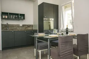 Pleasant holiday apartment with terrace, BBQ & garden | Garden view | Next to the beach - Image 5