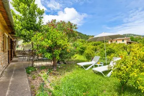 Holiday home with terrace, BBQ & garden | Garden view - Image 3