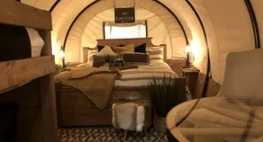 Charming Conestoga Wagon Rental for Unforgettable Glamping in Mineral Wells, Texas - Image 2