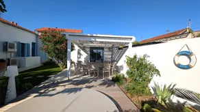 Family-oriented holiday home with terrace, hot tub & garden | Garden view - Image 2