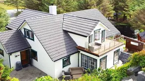 Pleasant holiday home with garden, terrace & sauna - Image 2