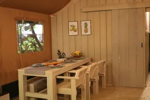 Glamping under canvas with a unique indoor play area featuring a slide. Great for adventurous families wanting to combine comfort with that outdoor feeling. - Image 3