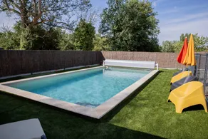 Ferienhaus mit Terrasse, beheiztem Pool und Garten - Image 4