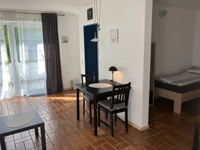 Holiday apartment with sauna, garden & terrace | Garden view - Image 2