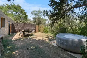Appartement de vacances avec terrasse, jacuzzi et jardin | Vue jardin - Image 5