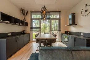 Luxury wellness cabin with freestanding bathtub, infrared sauna, hot tub and outdoor shower, directly next to Dwingelderveld National Park. - Image 4