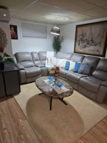 Serene Basement Retreat with Shared Pool Access in Sainte-Catherine - Image 3
