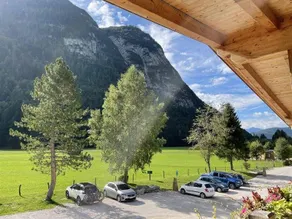 Mountain View Deluxe: Enjoy mountain views together, a balcony, and alpine luxury. Perfect for a romantic stay in summer or winter. - Image 5