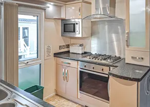 Two bedroom caravan sleeping 4 people with one double and one twin room. - Image 4