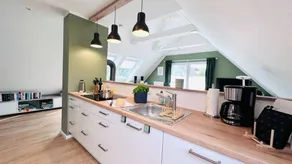 Appartement de vacances entièrement équipé avec sauna, barbecue et terrasse | Vue jardin | À côté de la plage - Image 2