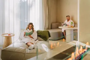 Experience luxury and relaxation in the Wellness Suite, featuring a sauna, jacuzzi, and a serene forest-edge location. - Image 4