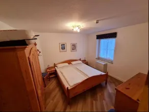Gemütliche Erdgeschossferienwohnung mit Kamin und Wintergarten in Petersdorf - Image 3