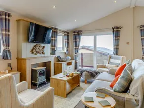 Lodge with pool & garden | Water view - Image 3