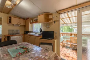 Beautiful mobile home with barbeque, terrace & garden | Garden view | Dogs allowed - Image 5
