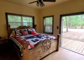 Escape to Elegance: Waterfront Cabin in a Texas Forest – Ideal Glamping Getaway - Image 4