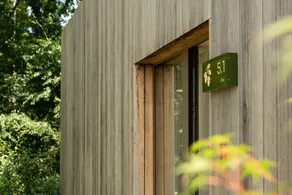 Enjoy a luxury vacation in the Lodge with Jacuzzi, accommodating 8 guests, set in a serene forest edge location. - Image 5