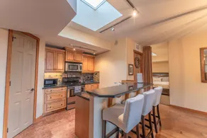 Mountain Views! Stunning Penthouse in Downtown Canmore Balcony + Fireplace - Image 3