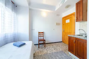 Room 'Habitación Triple' with Wi-Fi and Air Conditioning - Image 4