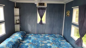 Whimsical Caboose Glamping Cabin with SpookyWoods Trail Near Penobscot River Lincoln, Maine - Image 4