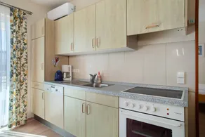 Familienorientierte Wohnung mit Sauna, beheiztem Pool und Grill | Gartenblick - Image 5