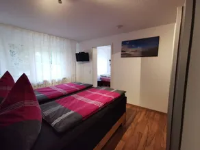 Agréable appartement convivial et familial avec internet haut débit, jardin et terrasse | Vue jardin | Avec animaux admis - Image 3