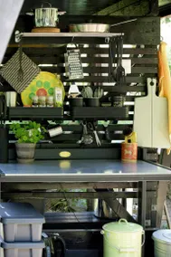 Small cabin with outdoor kitchen by forest stream - Image 5