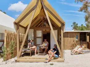 Family-friendly tent with heated pool, terrace & garden | Garden view | Close to the beach - Image 4