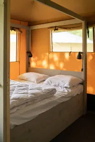 Glamping under canvas with a unique indoor play area featuring a slide. Great for adventurous families wanting to combine comfort with that outdoor feeling. - Image 5