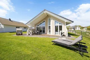 Holiday home with hot tub, garden & barbeque | Sea view - Image 2