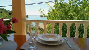 Pleasant holiday apartment with private pool, terrace & barbeque | Sea view - Image 5