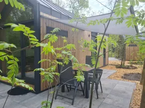 Cozy tiny house nestled among the trees or by the fishing pond for a wonderful family holiday full of adventure and relaxation. - Image 2