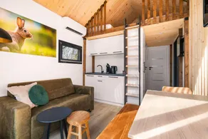 Cozy tiny house nestled among the trees or by the fishing pond for a wonderful family holiday full of adventure and relaxation. - Image 4