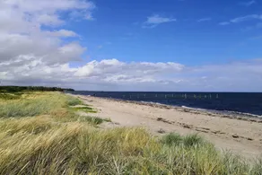 Family-oriented holiday home with hot tub, sauna & terrace | Water view | Dogs allowed - Image 2
