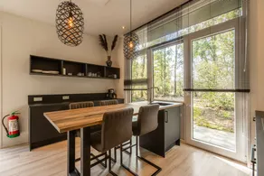 Luxury wellness cabin with freestanding bathtub, infrared sauna, hot tub and outdoor shower, directly next to Dwingelderveld National Park. - Image 3