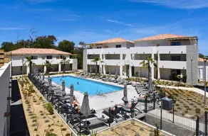 Flat with heated pool & BBQ | Pool view | Next to the beach - Image 2